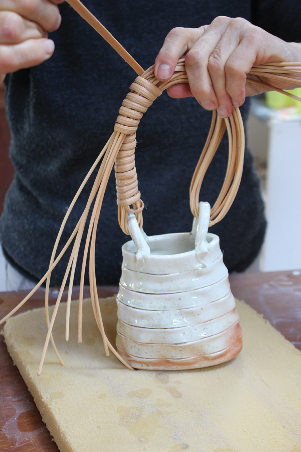 16 Continue wrapping and twisting evenly as you go around the handle right to the other side.