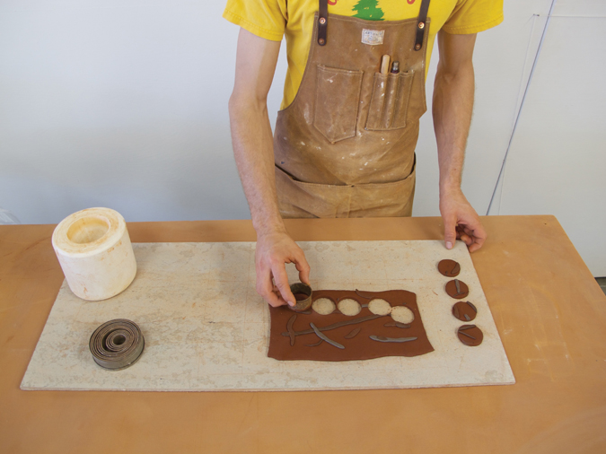Fig 2 Cutting out circles from a slab for the bottoms of the cups.