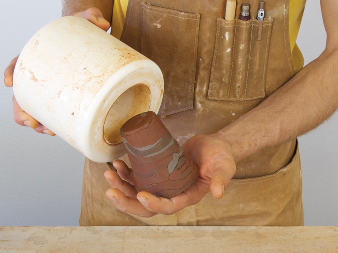 Fig 4 Removing cup from mold.