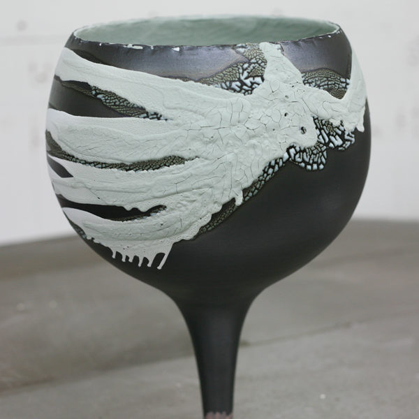 3 Next, apply a second layer of Mark’s Crawl Glaze in a different color over the top, varying the brush pattern slightly.