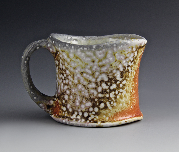 7 Mug, 4 in. (10 cm) in height, custom clay, no slip or glaze on exterior, shino liner glaze, soda fired to cone 11–12. 2014.