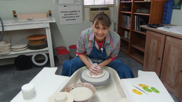 Antoinette Badenhorst working at the wheel in her studio.