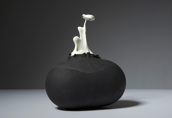 Emily Gardiner's Deliverance 002 (Material Catharsis Series), 13 in. (34 cm) in height, press-molded black stoneware, solid glaze, 2013. Photo: Sylvain Deleu.