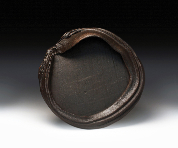 3 Ashwini Bhat’s Into the Mouths of Volcanoes, 24 in. (61 cm) in diameter, stoneware, fired to cone 12 in a wood-fired soda kiln, 2014.