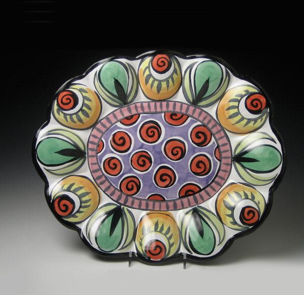 2 Kaitlyn Duggan’s Bounty, 15 in. (38 cm) in diameter, red earthenware, majolica glazes, stains, 2014.