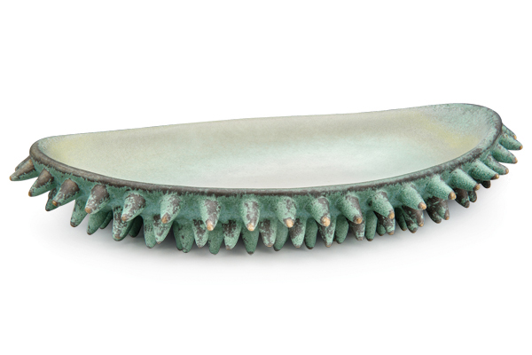 2&nbsp;Brenda Tarbell’s vessel with spikes, 13 in. (33 cm) in length, porcelain, glazes.