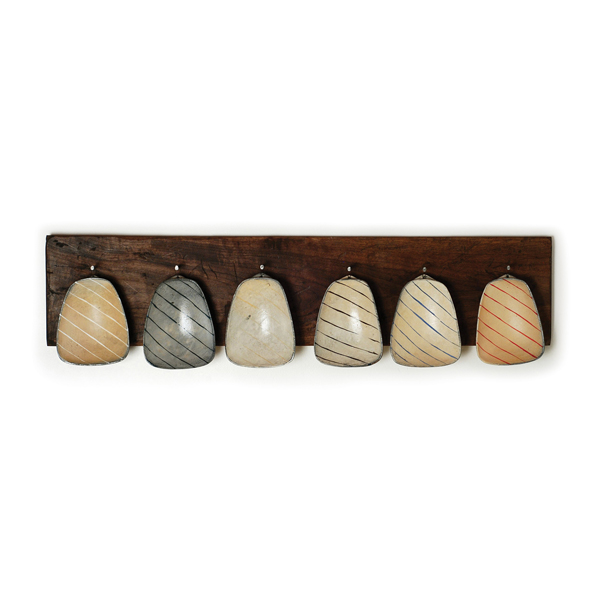 1 Tom Jaszczak’s porridge bowl set, 4 ft. 2 in. (1.3 m) in length, earthenware, 2014.