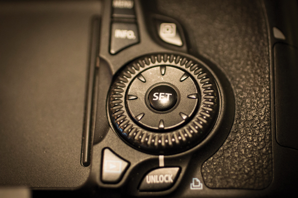 5 Select, then adjust your aperture using the scroll wheel on the camera body.