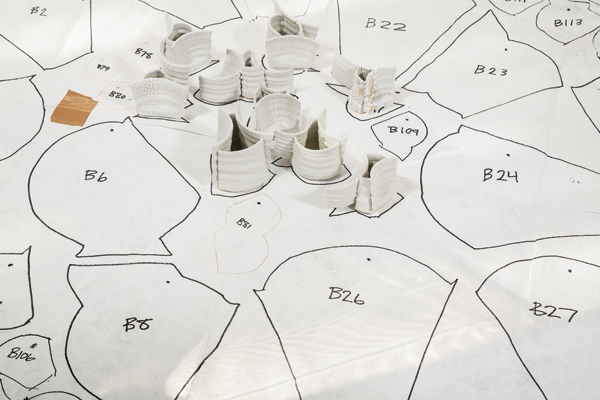 4 Tyvek template with pieces traced, numbered, and nail positions marked.