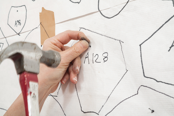 6 Nailing right through the tough Tyvek template.
