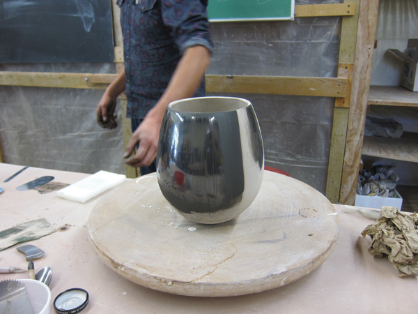 9 Three layers of slip are applied. The surface is burnished after each layer.