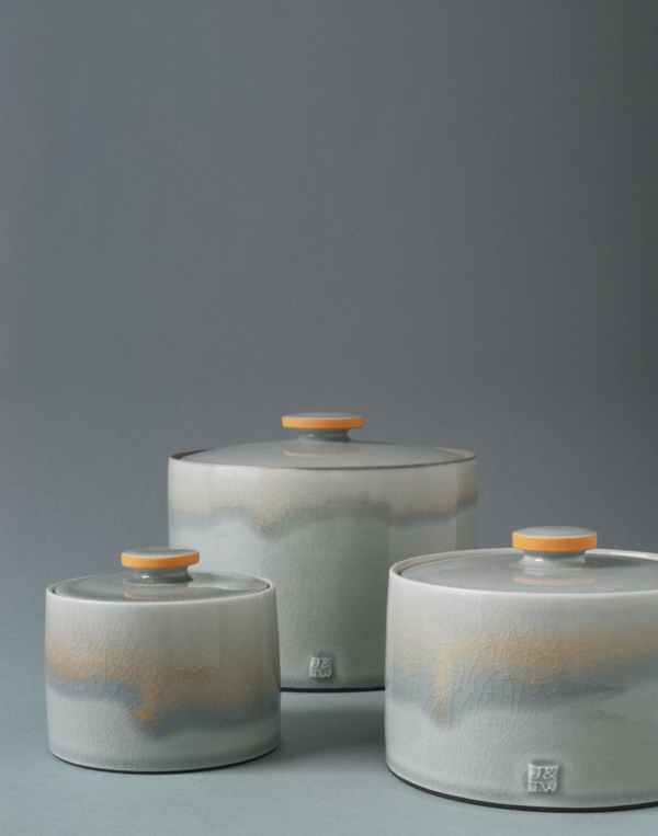 1 Gray and orange lidded jars, to 4 in. (11 cm) in height, wheel-thrown porcelain, slip, glaze, 2010.