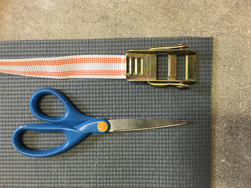 2 Use scissors to cut up old yoga mats to use as protection between your plaster molds and the mold straps.