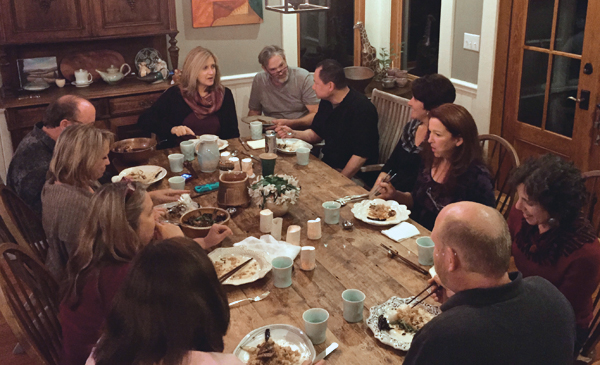 5 Guests enjoying lively discussions of clay and food.