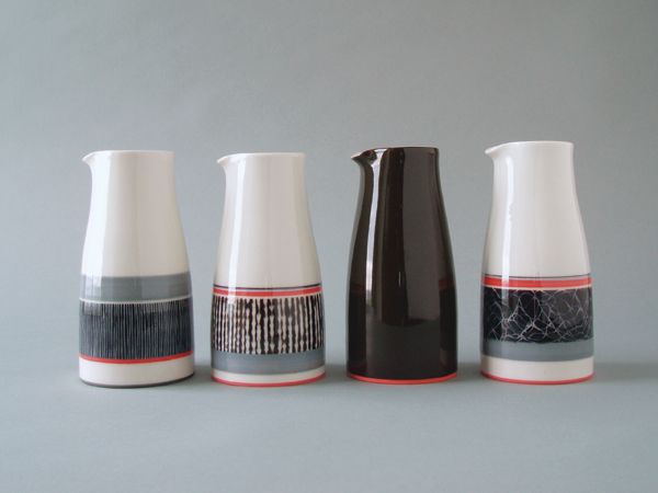 3 Large pourers, decorated and black and red, 5½ in. (14 cm) in height, wheel-thrown porcelain, slip, glaze, high fired, 2011.