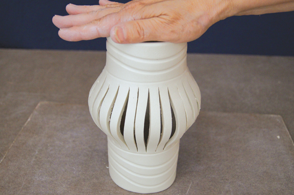10 Rotate light pressure around the rim and the slits will bow and separate farther.