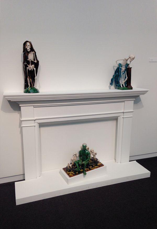 1 Mantel with Ignorant Skeleton, Pensive Skeleton, and I'm On Fire.