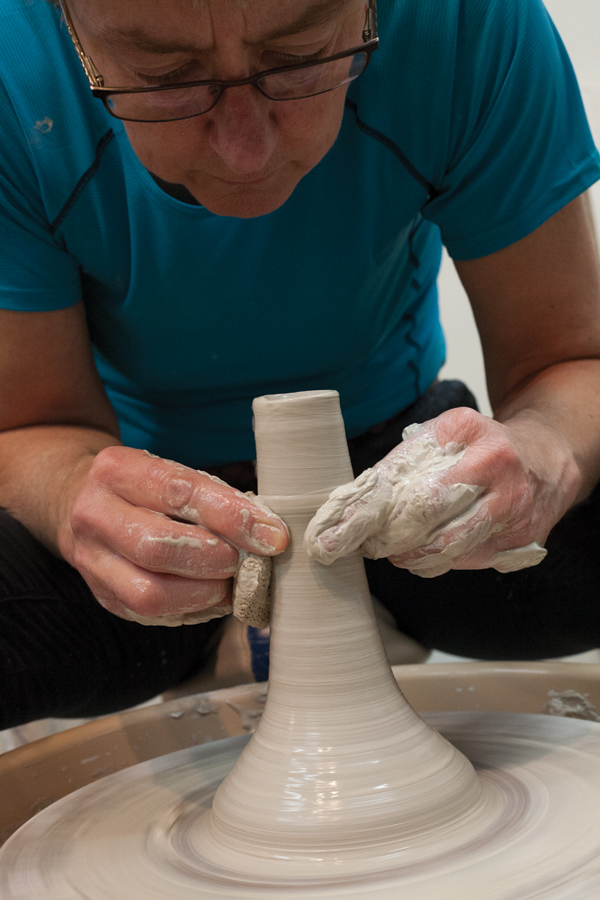 8 Throw a tall, hollow, narrow shape that will be used for the stem.