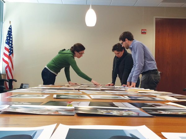 1 Editorial team from left to right: Jessica Knapp, Holly Goring, and Forrest Sincoff Gard, discussing Emerging Artist entries during the semi-finalist round. Photo: Erin Pfeifer.