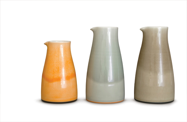 8 Small and large pourers in orange, gray, and smog glazes, to 5½ in. (14 cm) in height, wheel-thrown porcelain, slip, glaze, high fired, 2014.