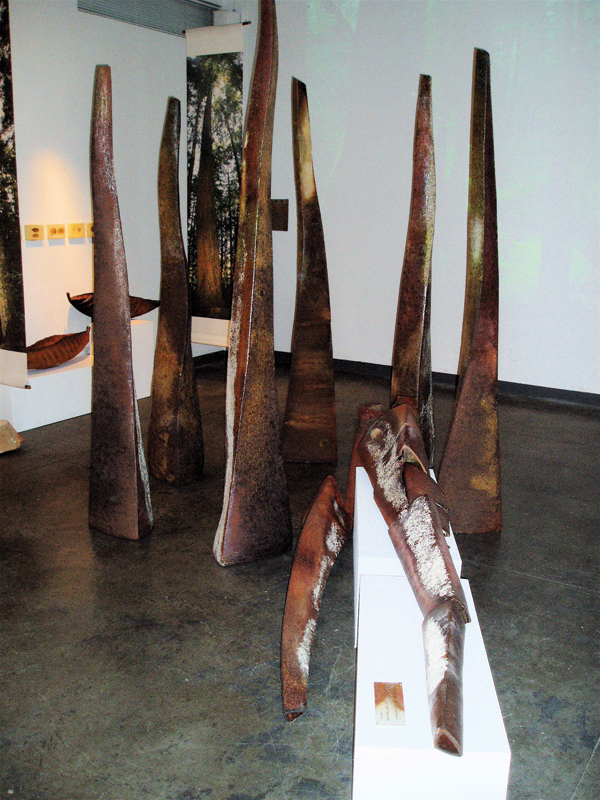 7 Tree Circle from the Reflecting Nature: Reflecting Spirit Installation, 7 ft. (2.1 m) in height, coil-built stoneware, single fired in a train wood kiln at the Archie Bray Foundation, 2007. Photo: John Sinal.