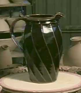 Finished faceted pitcher with a Temmoku Glaze, by Stephen Jepson
