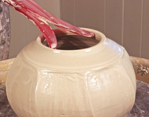 A Thin and raise the jar rim so a flanged lid can sit on top. Measure the opening.