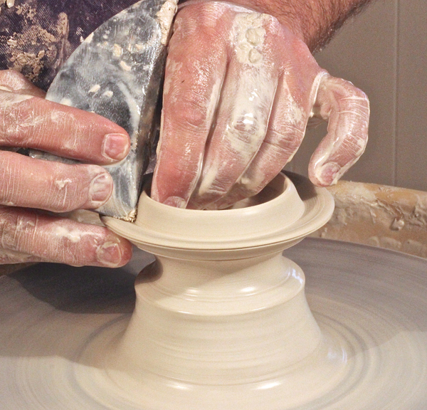 C When you reach the right diameter, use a rib to create the flange.