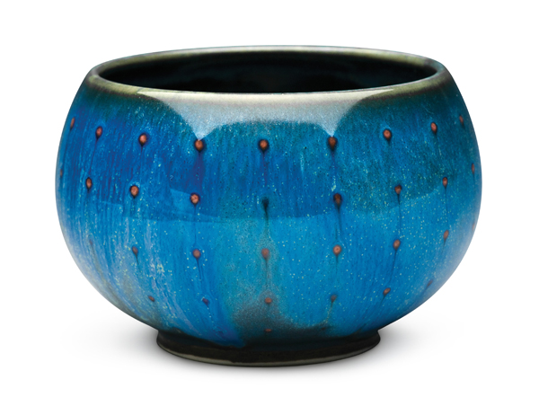 1 Red dots teabowl, 3½ in. (9 cm) in diameter, wheel-thrown porcelain, fired to cone 9 in oxidation then refired to cone 7 in oxidation. Photo: Bob Payne.