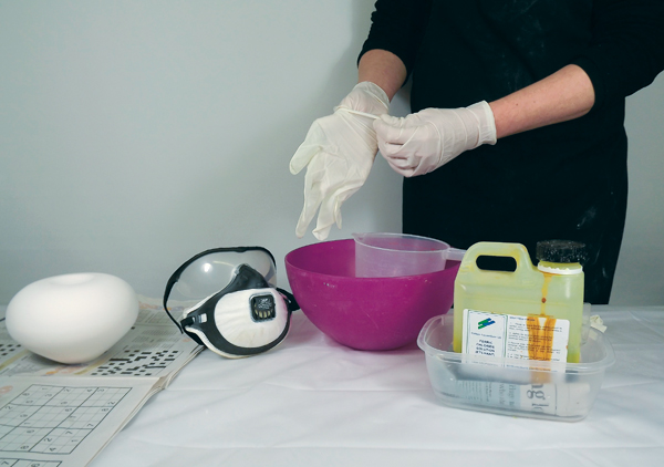 2 When applying ferric chloride, wear protective clothing including: an apron, two pairs of latex/non-latex gloves, a vapor respirator, and safety glasses.