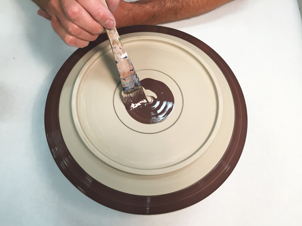 7 Apply underglaze to the bottom first, so that you don’t mar the underglaze on the rim by later placing the plate upside down.