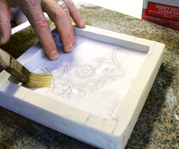 5 Brush acetone over the copied drawing to dissolve the ink and transfer the drawing to the mold.