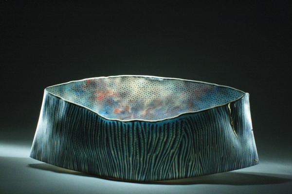 Vieques, 15 in. (38 cm) in length, handbuilt, colored porcelain, epoxy, gold leaf.