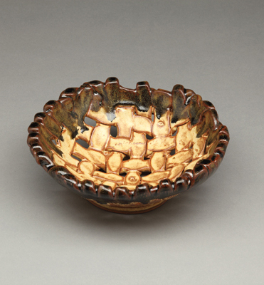 9 in. (23 cm) in diameter, Continental Clay BMix, banana yellow and tenmoku glazes. Photos of all fired work: Jafe Parsons.