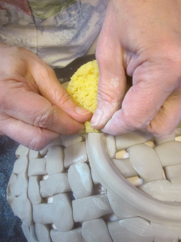 9 Throw the foot coil on the wheel, pressing down on the inside and outside to attach, then pull up slightly to give the foot height.