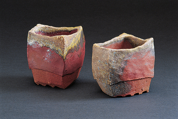 Cups, to 3 inches (8 cm) in height, handbuilt stoneware, wood ﬁred in an anagama.