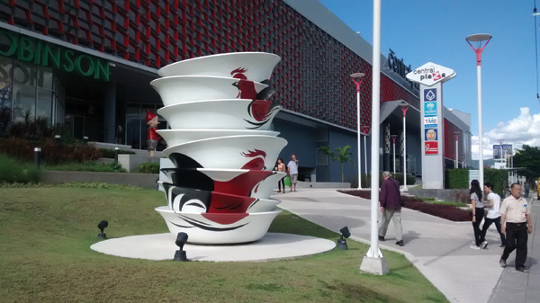 Public sculpture of the Dhanabadee factory’s famous chicken bowl design in Lampang, Thailand.
