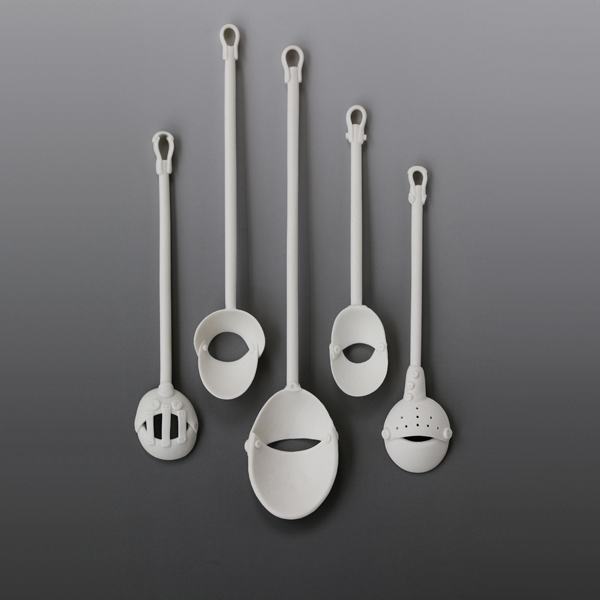 Leilani Trinka's Slotted spoons, to 9 in. (23 cm) in length, slab-built and modeled porcelain, steel pins, electric fired to cone 5, 2015.